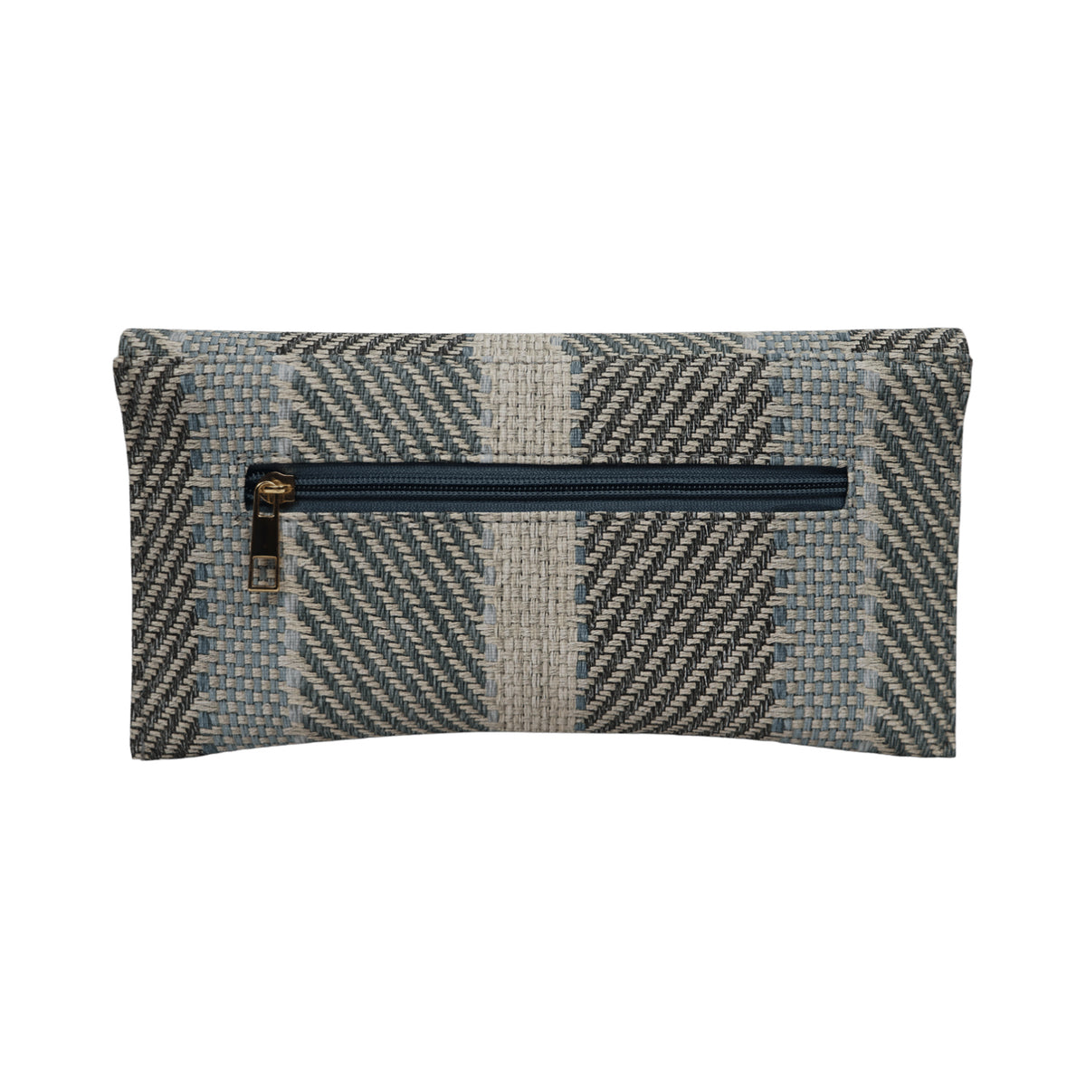 A modern handcrafted clutch with textured weave and bold metal detailing