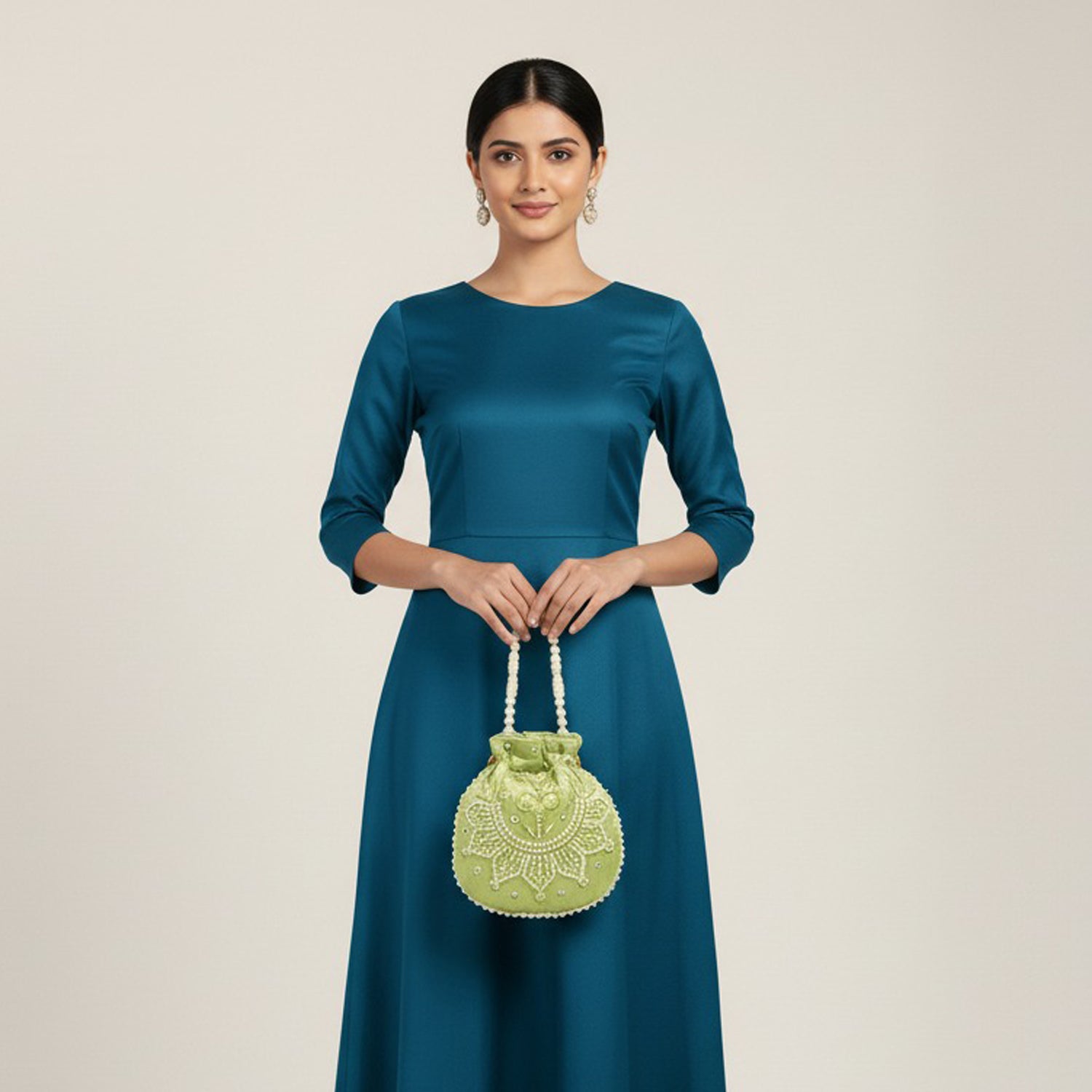 Pearl-Embroidered Potli Bag – A Royal Festive Essential - light green